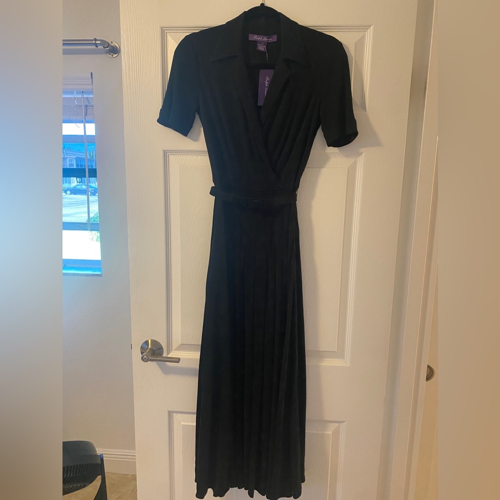 Elegant 3/4 length pleated and belted dress. Fully lined with side zippe…